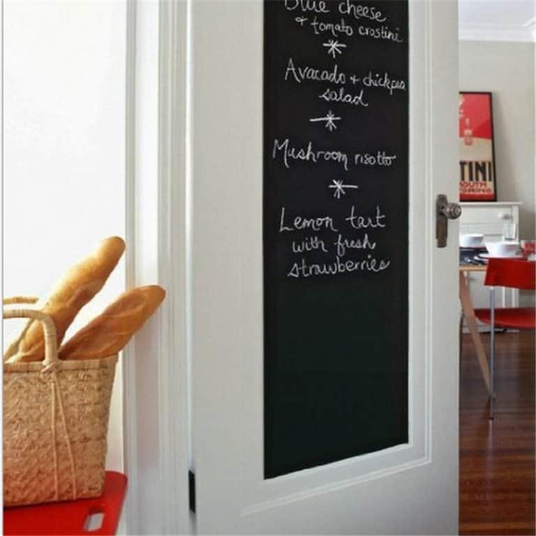 A door with a chalkboard sticker for cute messages 